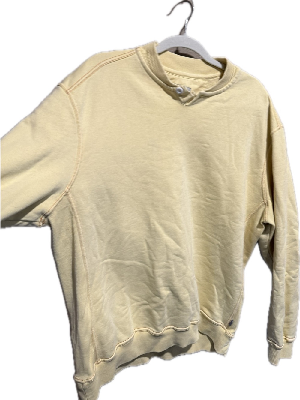 X-Large 32 Bar Blues worn in yellow pullover with signature single top button.